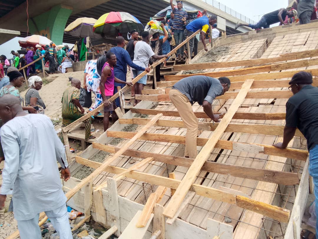 Construction of Two-Way Railway Track Staircase at Pen Cinema, Agege